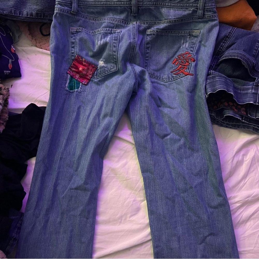 Stylish Blue Jeans with Unique Patches
